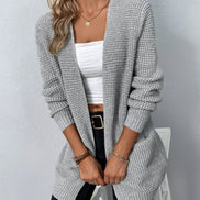 Halira cardigan til kvinder med åben front, lange ærmer og sidelommer