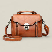 Elmira taske dame – skuldertaske med klaplukning og crossbody rem