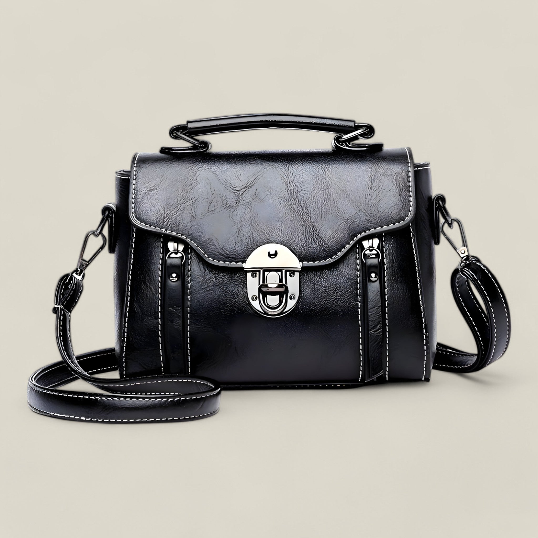 Elmira taske dame – skuldertaske med klaplukning og crossbody rem